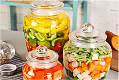 What stages are involved in the melting process of glass bottles?